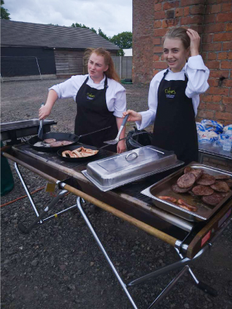 Picture of our students cooking at The Chris Carberry Golf Day - Image 1