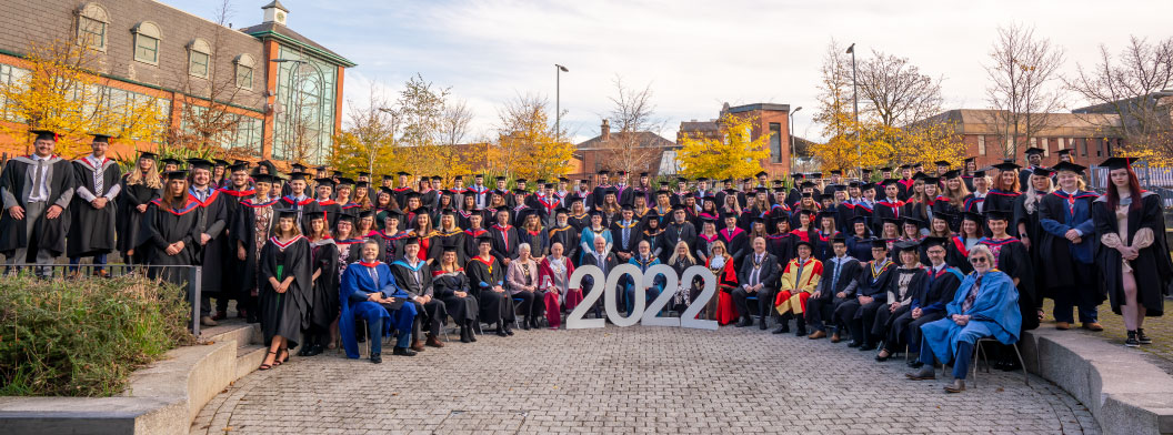 Big group picture of our 2022 graduates and guests of honour.