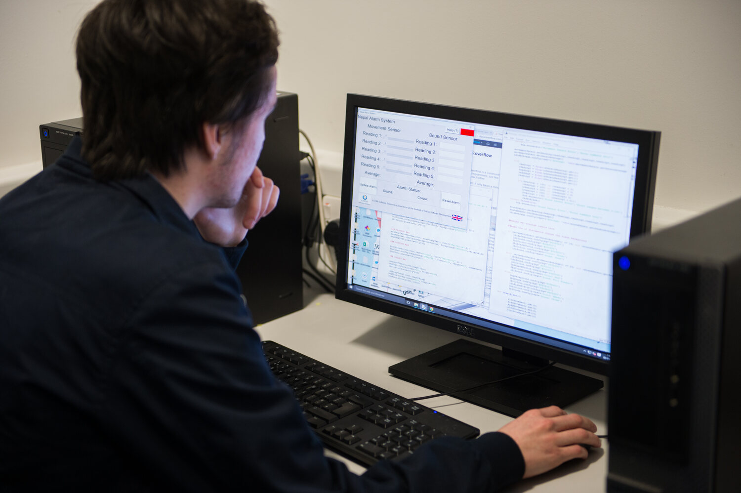 computing student on computer