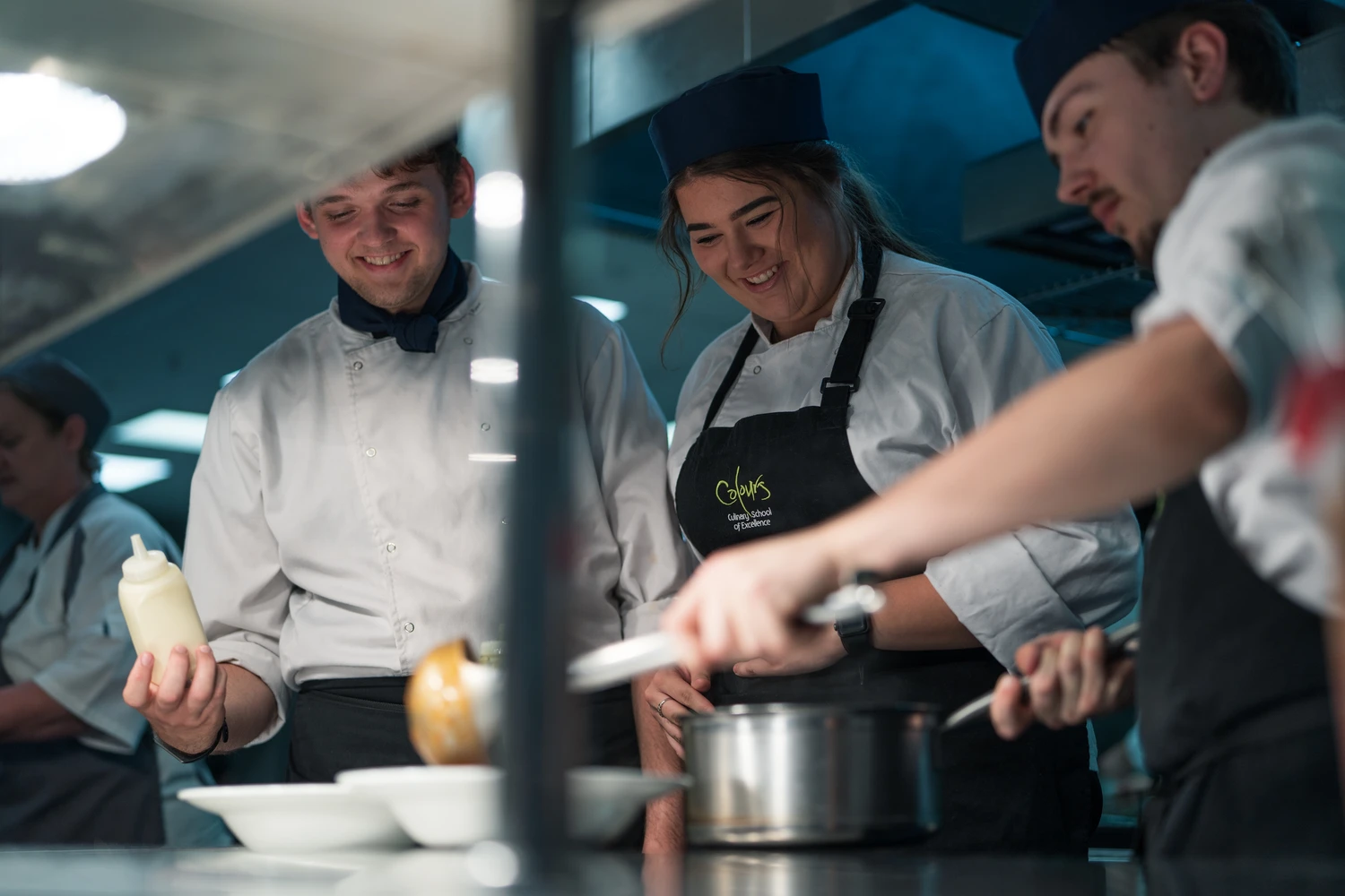 Students preparing dishes