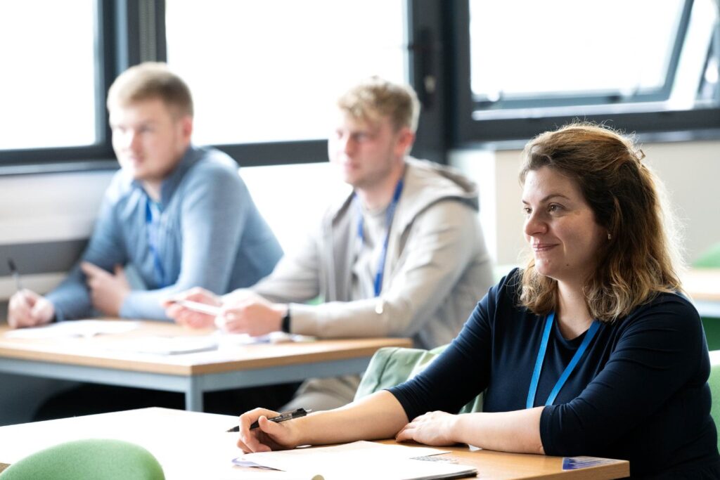 Students sat at desks in a classroom