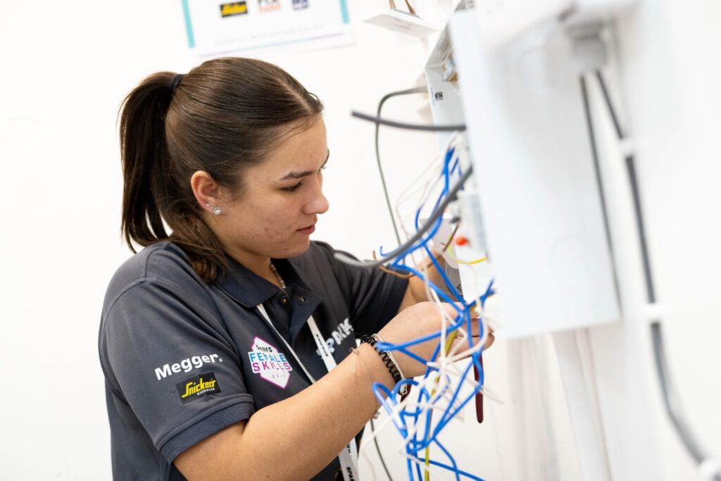 Female student in plumbing competition