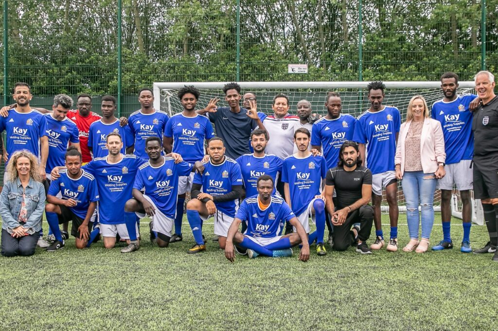 Group picture of the ESOL refugee football team