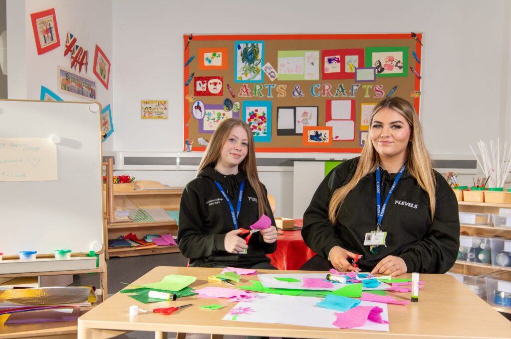 Two student making crafts