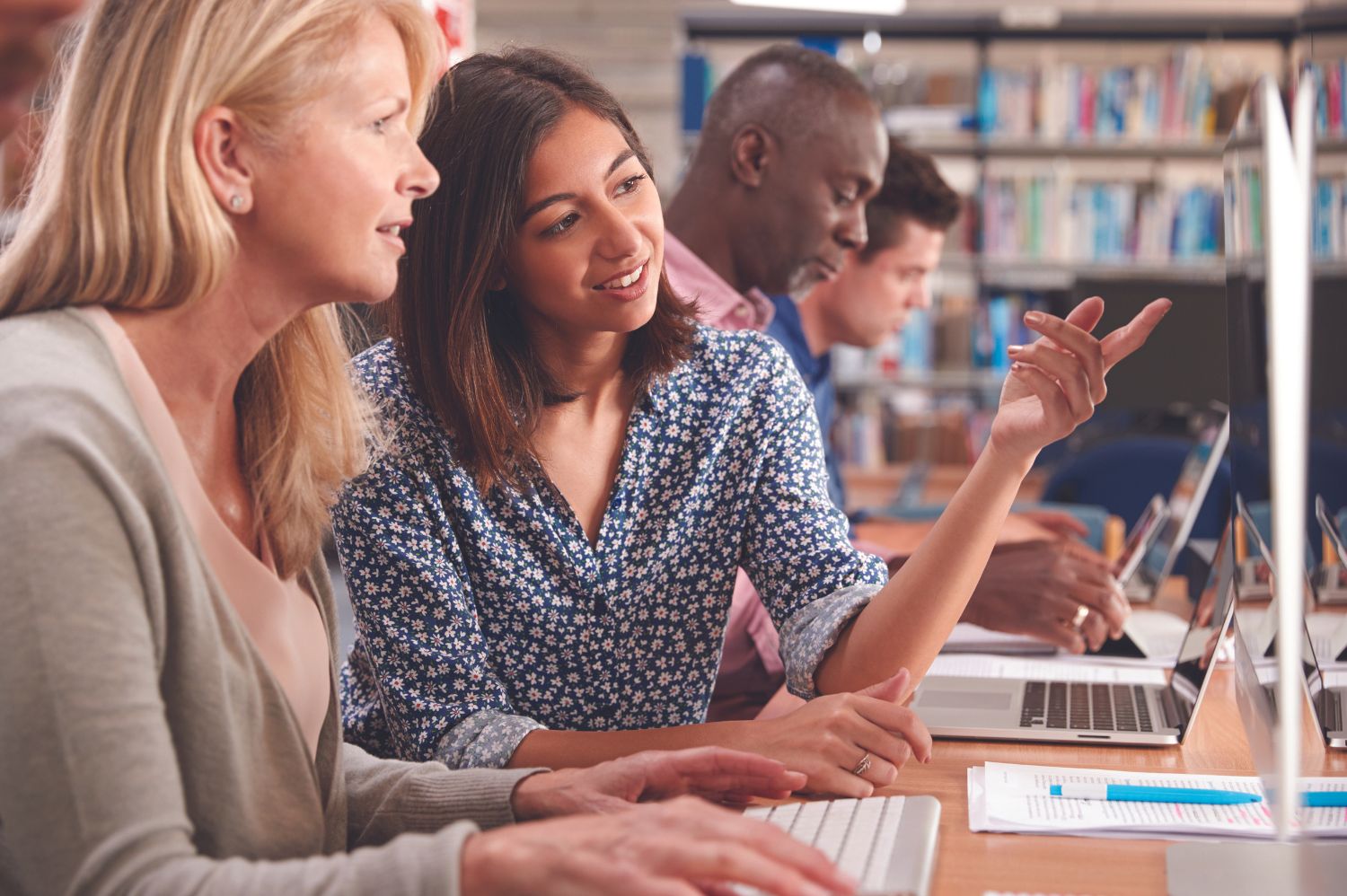 Picture of adult learners using a computer