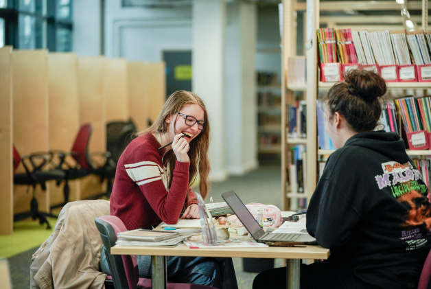 students in library