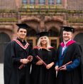 St Helens College graduates at graduation in their cap and gown