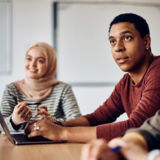 Pictures of adult learners in a classroom